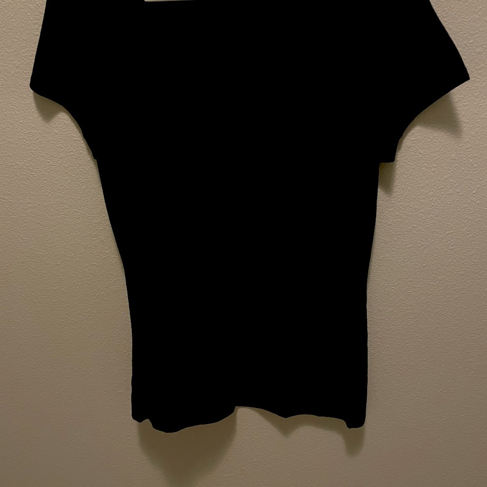 Plain black tee- goes with everything. Super cute